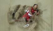 PHOTOS: Taylor wins triple jump gold with second-longest ever leap