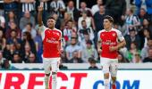 Premier League: Arsenal labour to victory over 10-man Newcastle