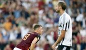 Euro soccer round-up: Roma hand Juve second successive defeat