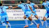 India survive anxious moments before prevailing over Canada