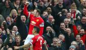 EPL PHOTOS: Rooney ends goal drought; United go third