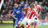 EPL PHOTOS: Manchester United split points with Stoke City