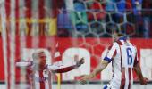 Atletico use their heads to turn up heat on Real