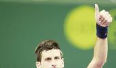 Djokovic eases past compatriot in Doha