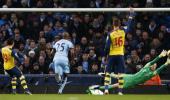 Cazorla shines as Arsenal hit Man City's title bid