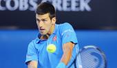 Australian Open: Djokovic crushes Raonic to advance, faces Wawrika in semis