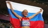 Dope shame: Olympic champ Zaripova and Kenya's Jeptoo get bans