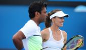 Wimbledon: Paes-Hingis through to semi-finals, Sania crashes out