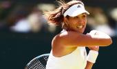 Spanish finalist Muguruza growing to love grass