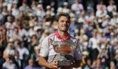 Inspired Wawrinka tames Djokovic to win French Open