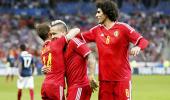 Fellaini nets double as Belgium humble France