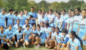 Dhoni motivates junior women hockey players