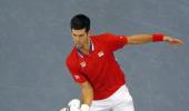 Serbia, France sail into Davis Cup last eight