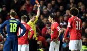 Di Maria red card adds to van Gaal's woes; Wenger praises Welbeck