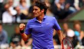 Photos: Federer moves smoothly into fourth round