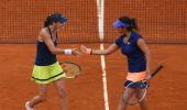 Sania-Martina pair storms into quarters; Paes, Bopanna ousted