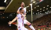 EPL PHOTOS: Palace lord over Liverpool; Spurs hold Arsenal in derby