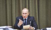 Putin says Russia to probe doping allegations