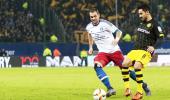 Bundesliga: Hamburg surprise Dortmund amid tight security