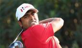 Lahiri stays afloat with late birdies in Dubai