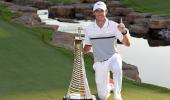 McIlroy wins DP World Tour Championship, tops money list again