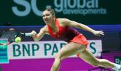 WTA Finals: Halep storms to victory in opener