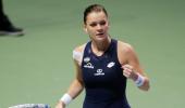 WTA Finals: Radwanska sees off Muguruza to book final berth