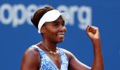 US Open PHOTOS: Venus, Serena set up quarters clash; Djokovic stretched