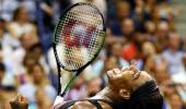 Serena trumps sister Venus to keep calendar Slam on track