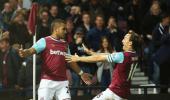 EPL PHOTOS: Hammer Payet's double sees Newcastle slide to bottom