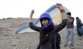 PHOTOS: Women paragliders soar through Kabul's skies