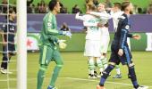 Champions League PIX: Wolfsburg shock Real; City draw against PSG