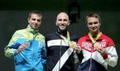 Italy's Campriani takes 10m air rifle gold, Bindra misses medal