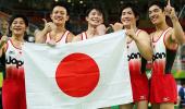 Japan end China's reign as team champions