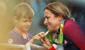 American Armstrong wins third straight time trial cycling gold