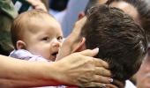 In PIX: Michael Phelps, the father...