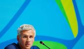 US swimmer Lochte says gun held to forehead in taxi hold-up