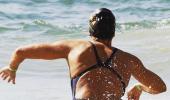 Spanish marathoner swimmer mingles with crowd at Copacabana