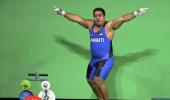 Kiribati weightlifter adopts unique style to spread message at Rio