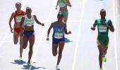 Semenya cruises in 800m heats; Farah survives scare