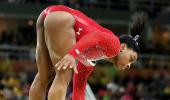 PHOTOS: Simone Biles slips on beam; shows she's human...