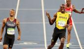 Not so fast young man, Bolt cautions De Grasse