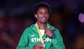 Ethiopian marathoner stays put in Rio, vows to fight for land rights