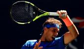 PHOTOS: Energized Nadal completes straight-sets win in opener