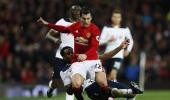 EPL PHOTOS: Man United sink Spurs; Chelsea go top