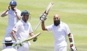 Determined Amla returns to form as England made to toil