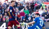 La Liga: Messi treble lifts Barca to the top of table