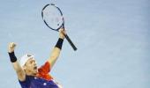 Hewitt prolongs Australian Open swansong as family watches from stands