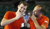 Big brother Murray sets the tone by clinching doubles crown