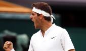 PHOTOS: Del Potro knocks out Wawrinka, Serena and Venus survive